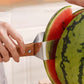 Cortafrutas triangular de acero inoxidable con mango de madera para cocina